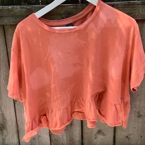 Orange crop top with ruffle hem